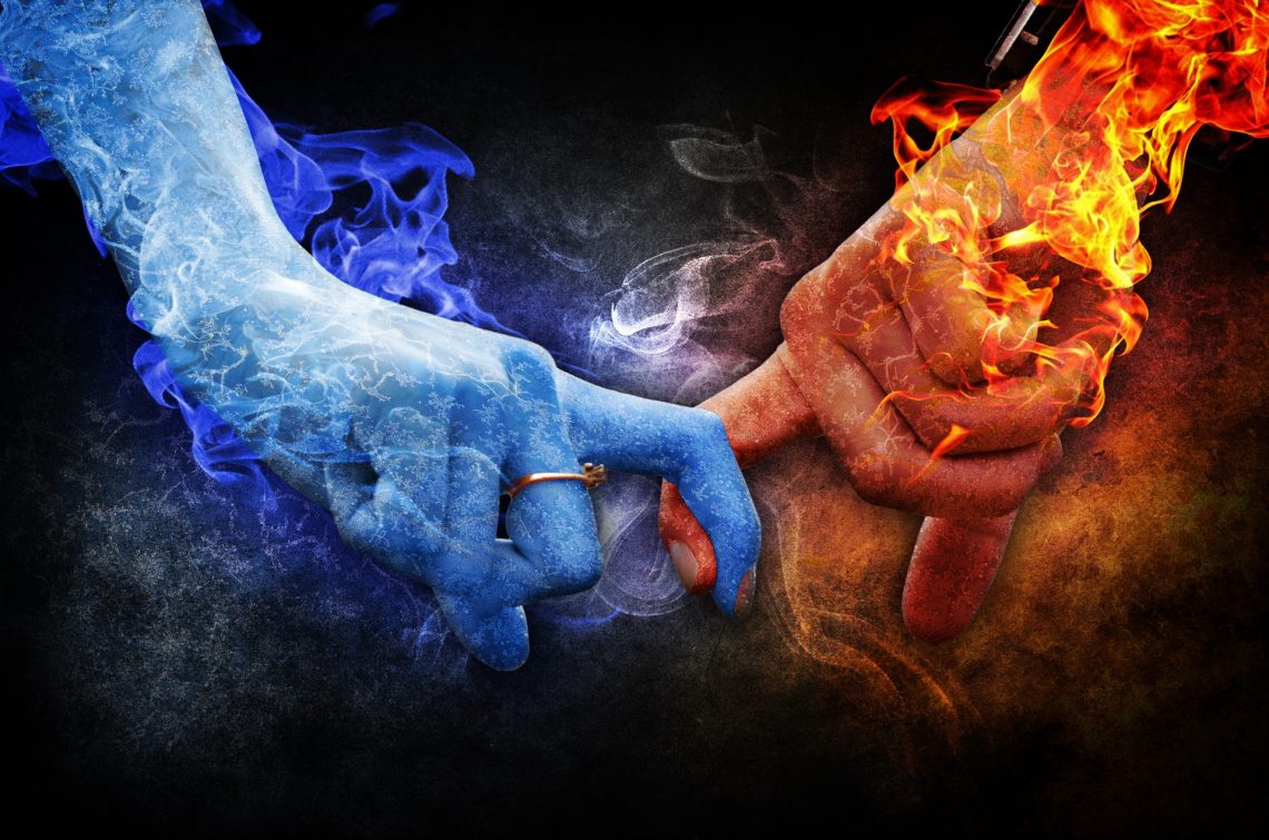 artistic image of two hands linked symbolizing passionate connection